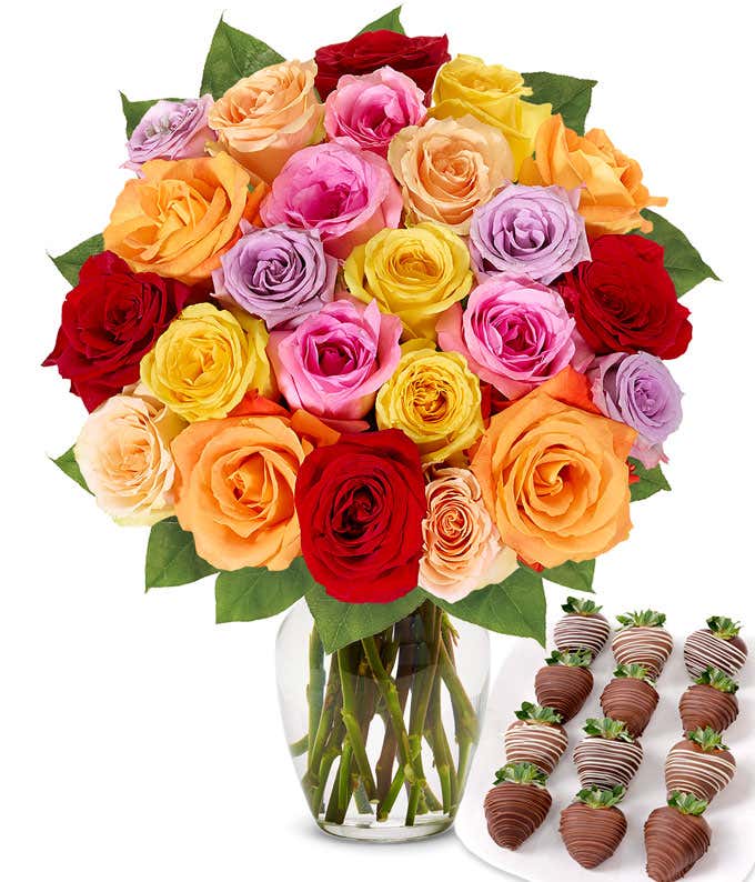 Two dozen rainbow roses with one dozen chocolate covered strawberries.