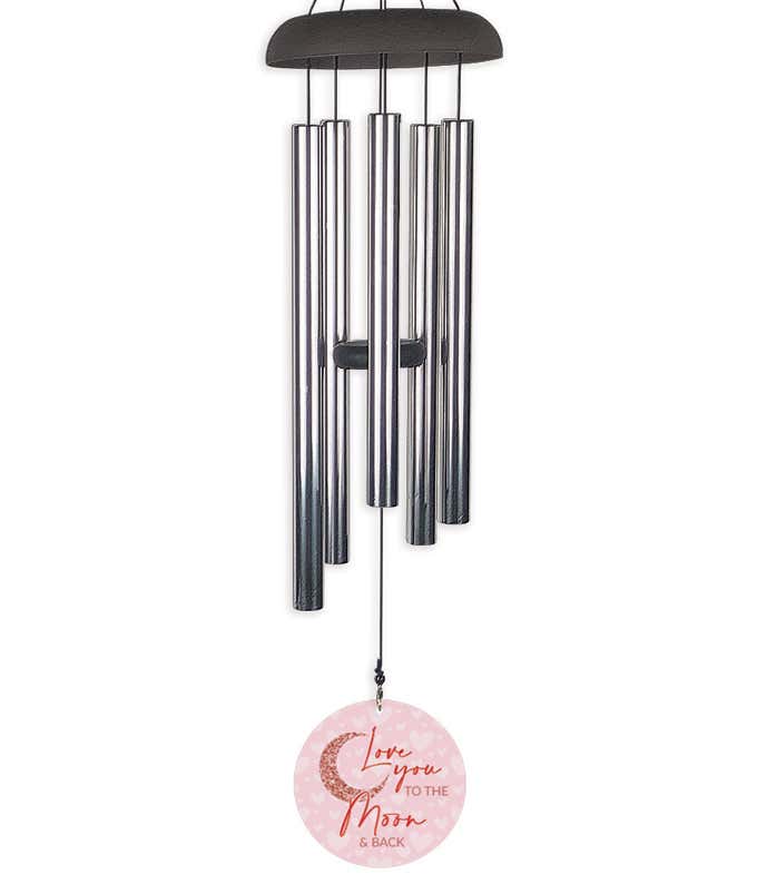 Wind chime with a sail that reads Love You to the Moon and Back, in shades of pink and red.